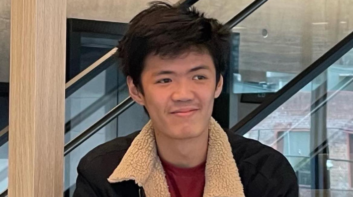 Marcus smiling, featured in Iglu regional scholarship profile.