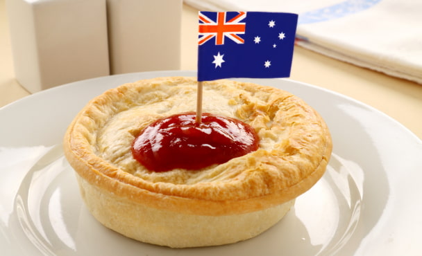 meat pie classic aussie dish with tomato sauce and australian flag