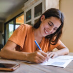 Student signing student accommodation contract.